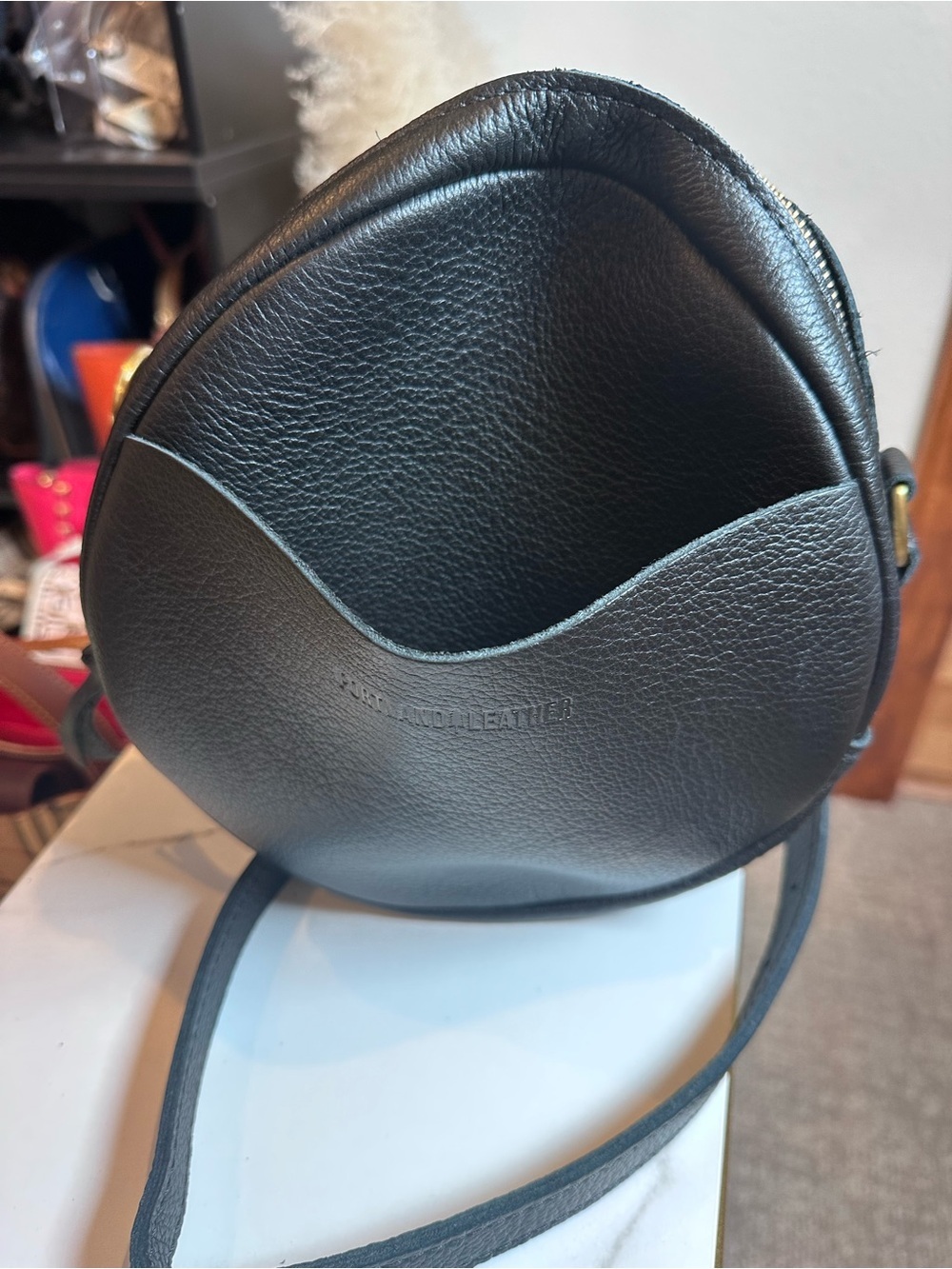 PORTLAND LEATHER GOODS Large 9"
Circle Crossbody Bag Black Pebbled
Leather - Picture 2 of 7